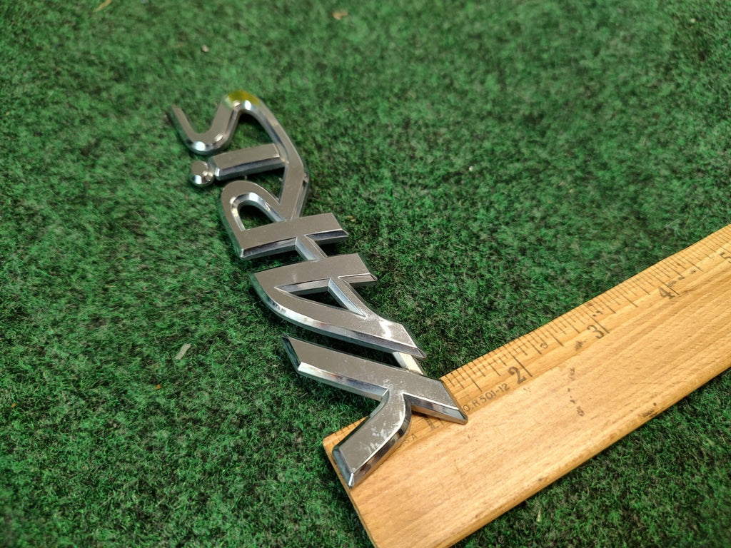 2006-2011 TOYOTA YARIS REAR EMBLEM LOGO BADGE SYMBOL CHROME LETTERS OEM 2S7