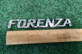 04 05 06 07 08 SUZUKI FORENZA REAR TRUNK LID EMBLEM LOGO BADGE SIGN OEM 8L4