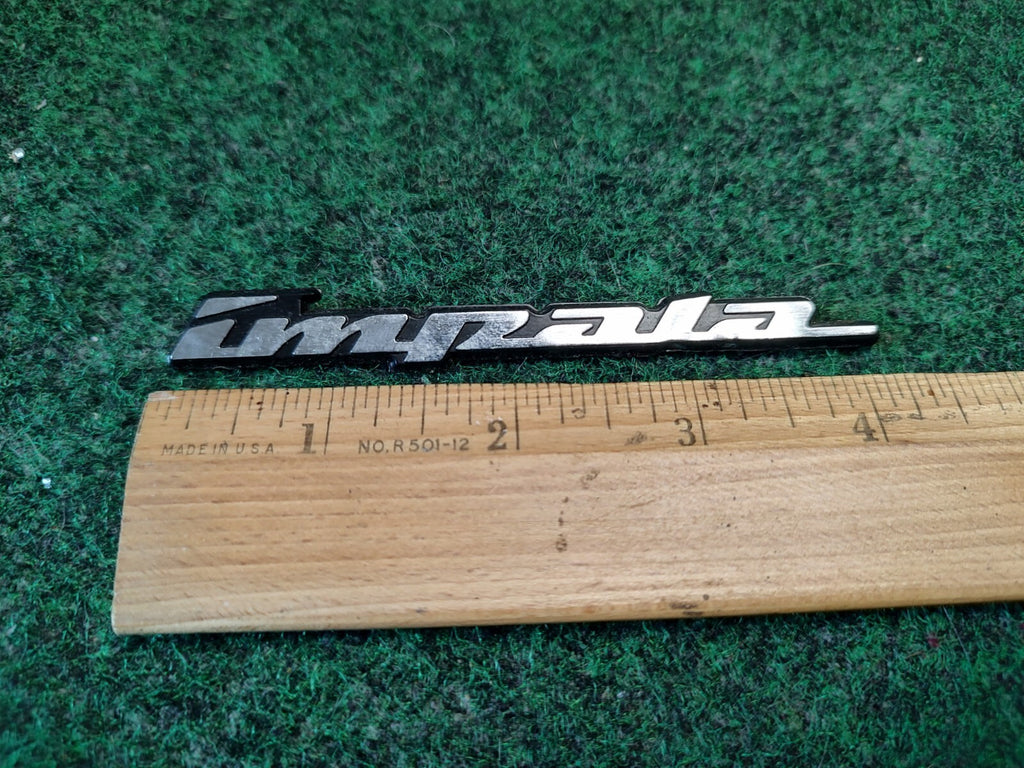 2000-2005 Chevrolet Impala Panel Emblem NAME PLATE BADGE 10290600 OEM 4S1