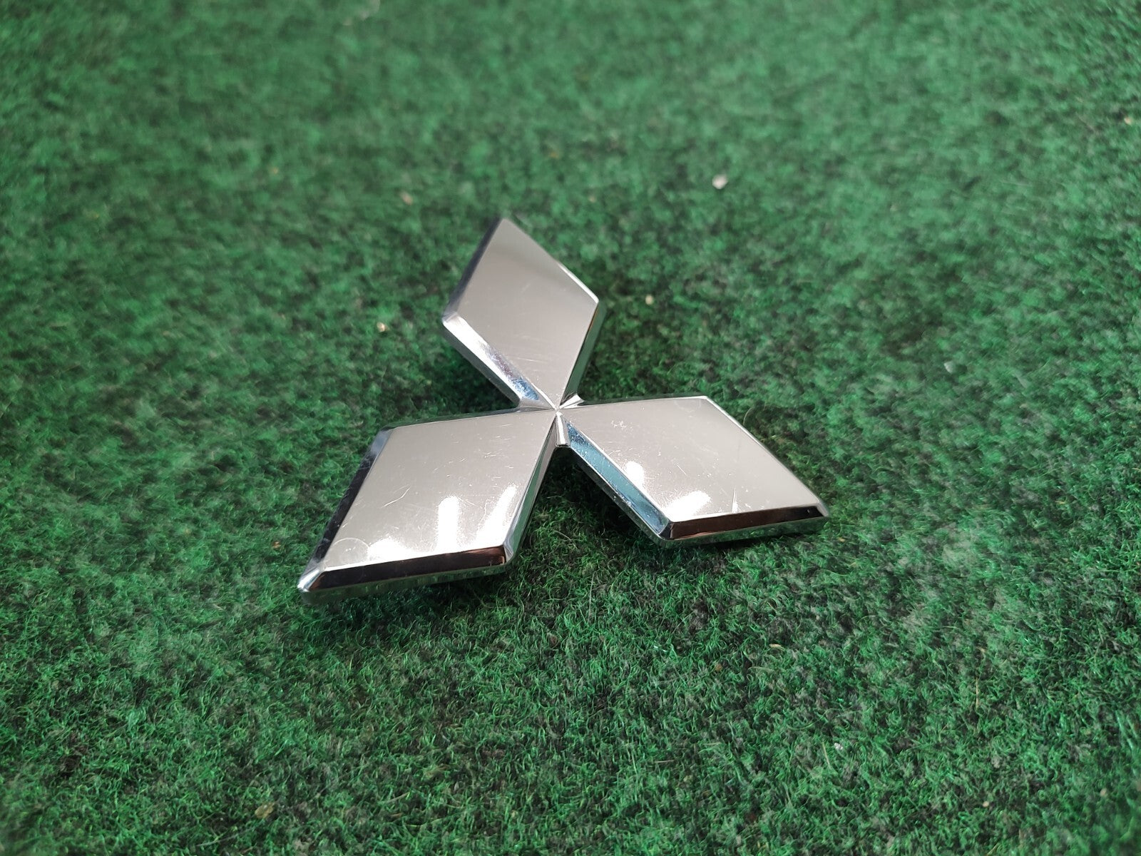 2002-2005 Mitsubishi Eclipse Rear Trunk Emblem Logo Nameplate MR971390 OEM 1S5
