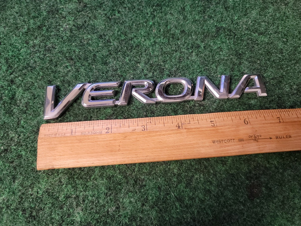 Suzuki Verona Rear Trunk Badge Emblem OEM Genuine Used 2004-2006 Sedan 2S9