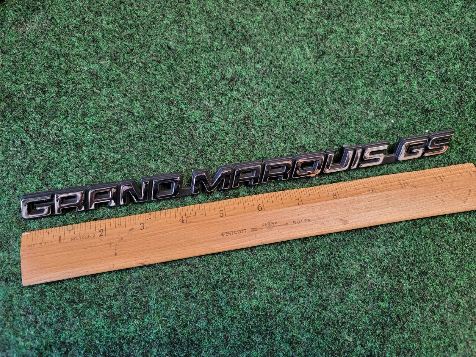 98 99 00 01 02 MERCURY GRAND MARQUIS GS REAR EMBLEM BADGE SYMBOL OEM 1M6