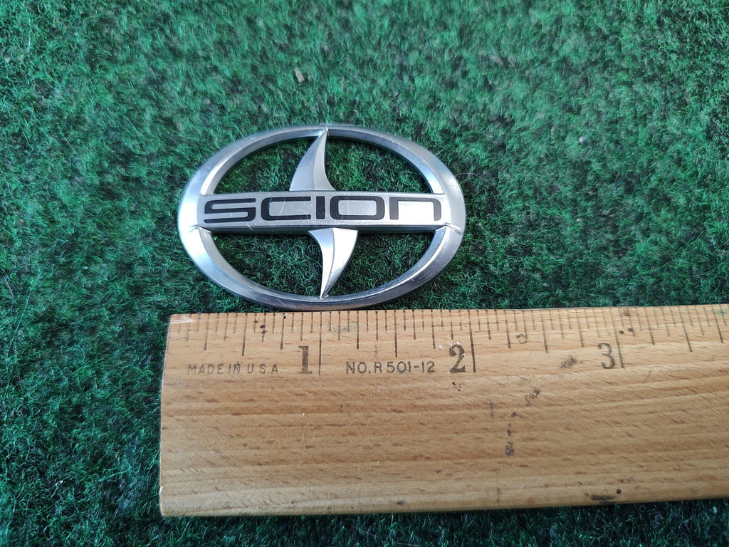 Scion 2" Wide Emblem Badge 2912 UNKNOWN Year Model OEM 2M9