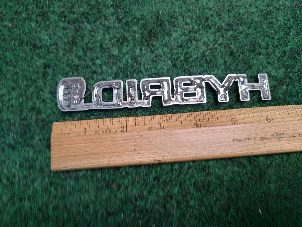 07 08 09 TOYOTA PRIUS HYBRID SIDE FENDER EMBLEM LOGO BADGE SYMBOL USED 3S5
