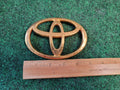 TOYOTA MATRIX GRILLE EMBLEM 75311-AA030 OEM Gold 1M9