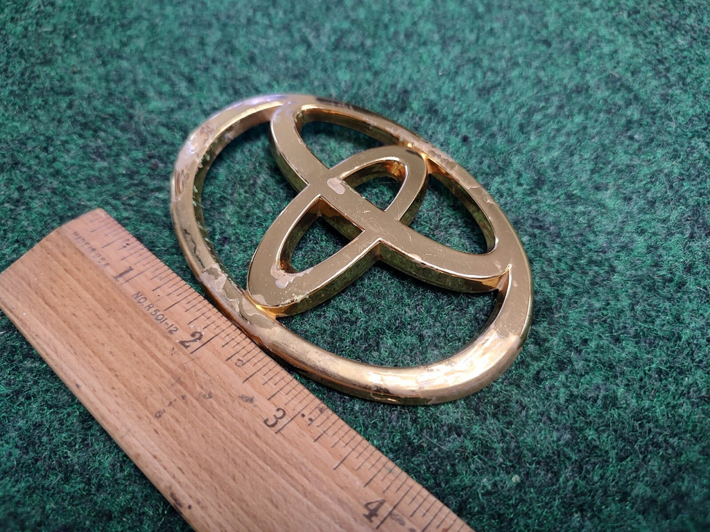 Toyota Gold Plastic Emblem Badge Logo OEM 4 INCH Wide 1S8