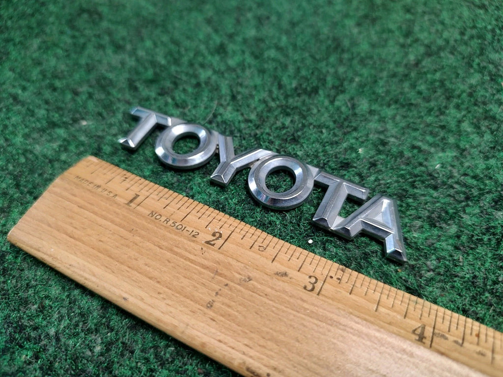 Toyota OEM 1998-2002 Corolla Sedan Rear Trunk Emblem Badge Logo 75441-12770 1S6
