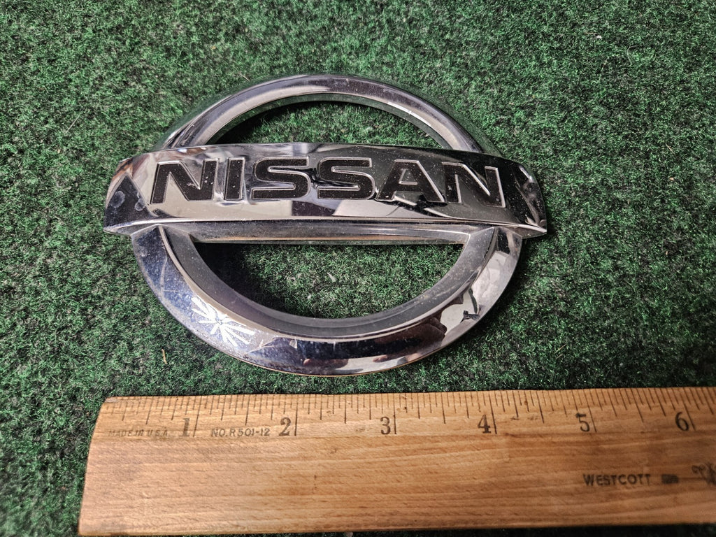 2005-2012 Nissan Pathfinder Xterra 2013 - 2015 Titan Rear Emblem 90891-EA500 2L4