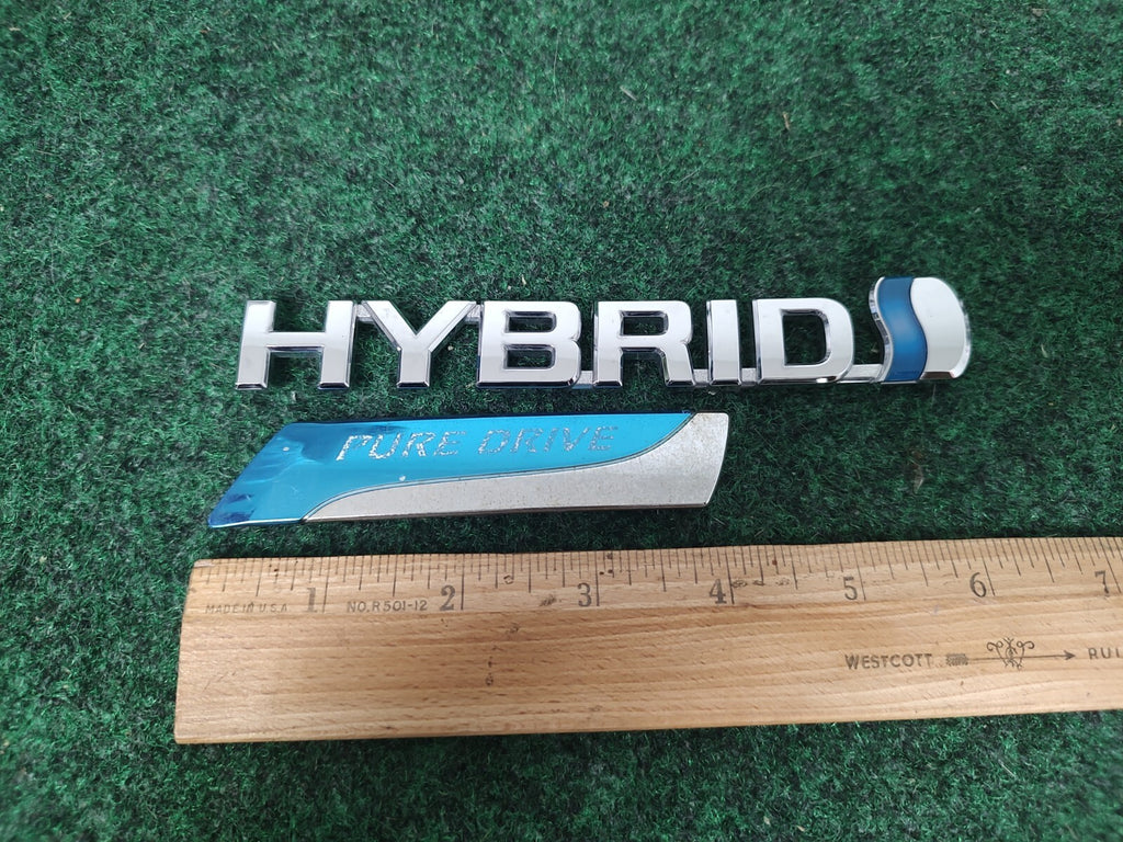 TOYOTA PRIUS HYBRID SIDE FENDER EMBLEM LOGO BADGE SYMBOL USED 1M4