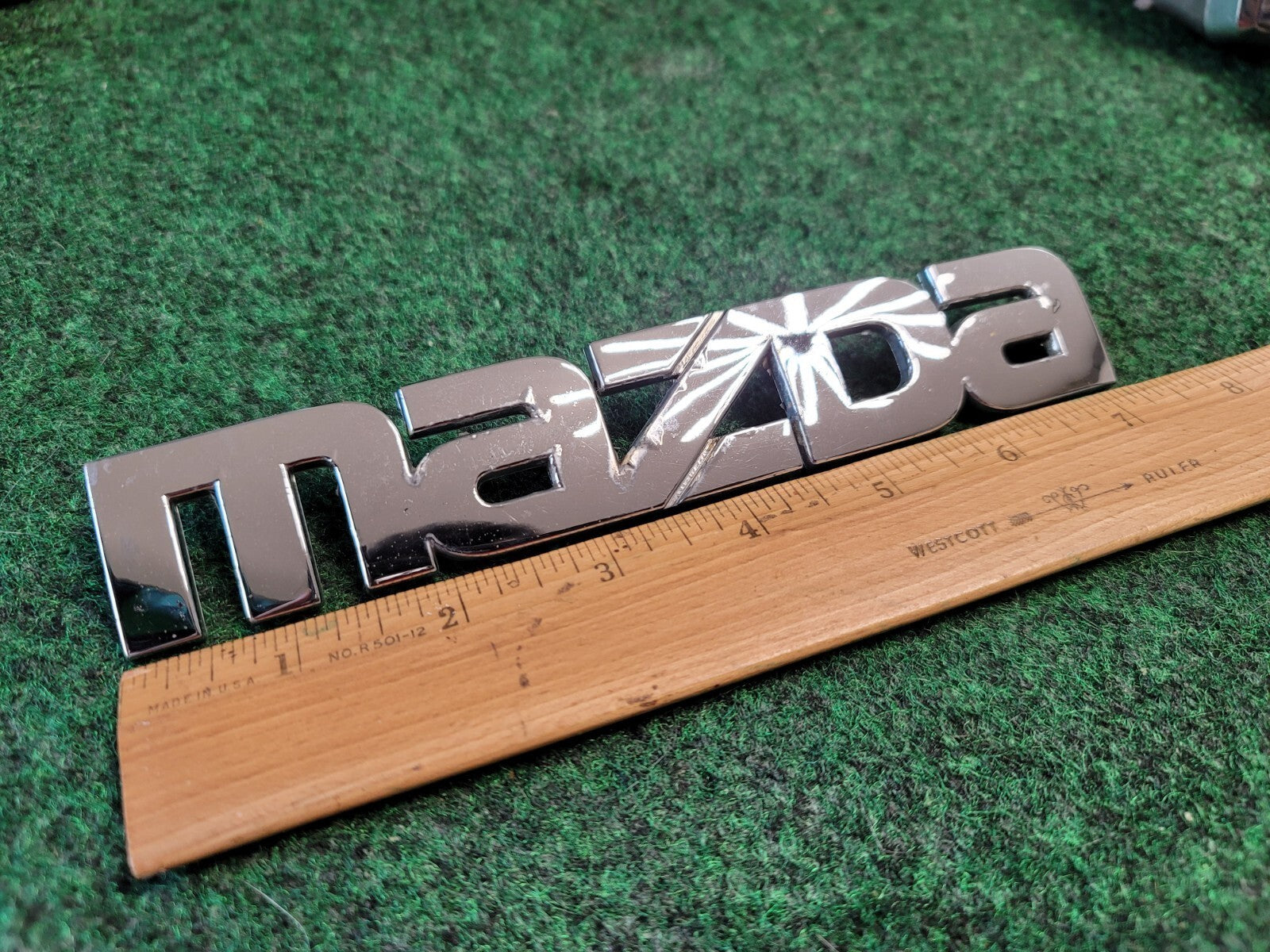 2000-2006 Mazda MPV Rear Emblem Name Plate LC62-51710 1M9
