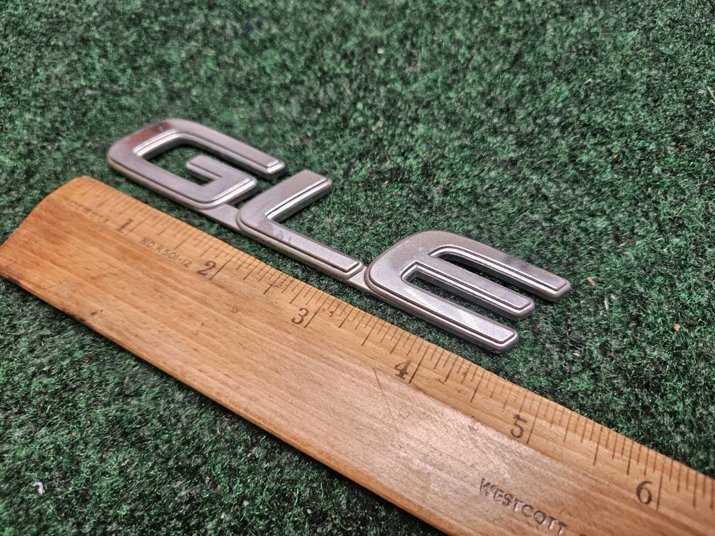00-01 Nissan Maxima GLE Trunk Lid Emblem Nameplate OEM 84896-2Y903 Silver 5M3