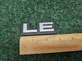1987-1996 Dodge Dakota LE Cab Corner Emblem Name Plate Badge  55026887 GL3
