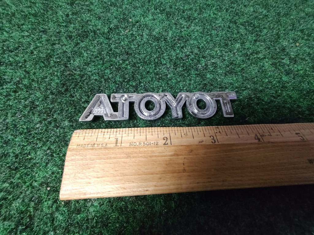 Toyota Luggage Compartment Door Name Plate Emblem 75446-52030 Genuine Oem 6S1