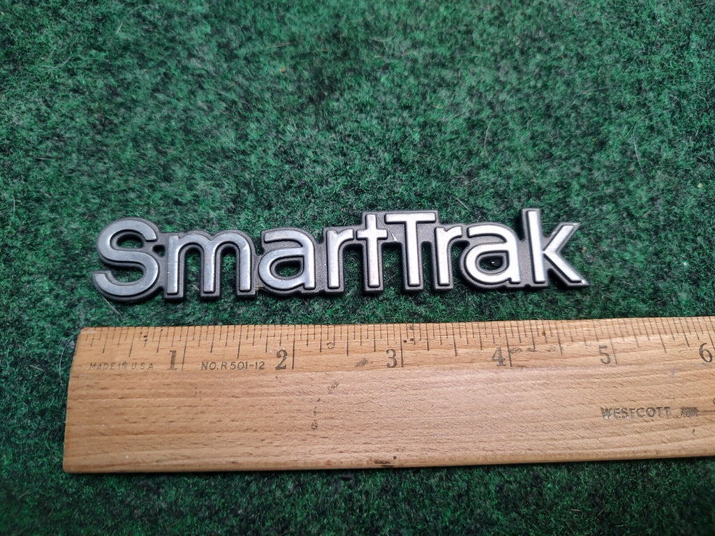 OLDSMOBILE SMART TRAK SMARTTRAK EMBLEM LOGO BADGE SYMBOL OEM USED 3S6