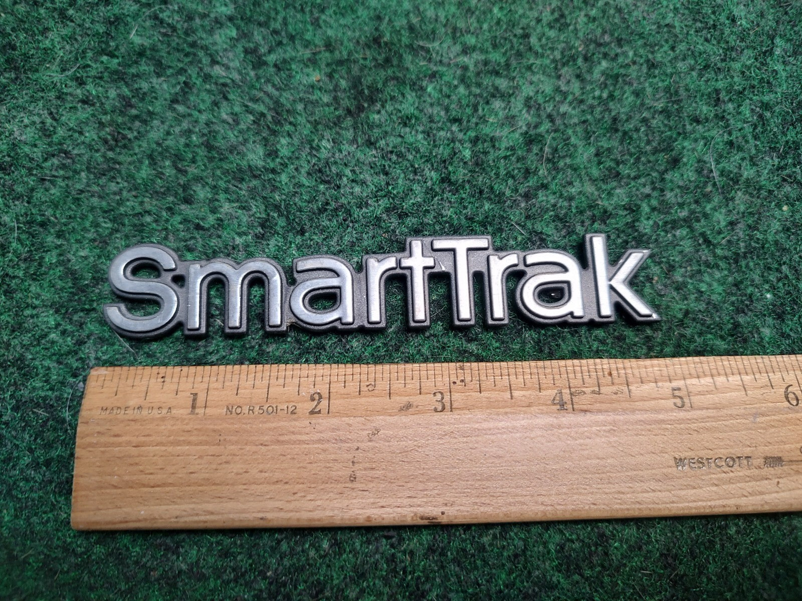 OLDSMOBILE SMART TRAK SMARTTRAK EMBLEM LOGO BADGE SYMBOL OEM USED 3S6