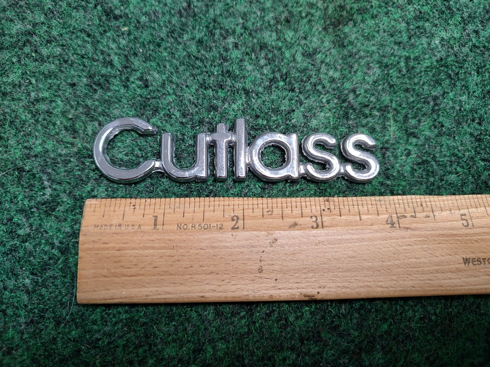 Oldsmobile Cutlass Emblem Nameplate Chrome Metal OEM 1S2