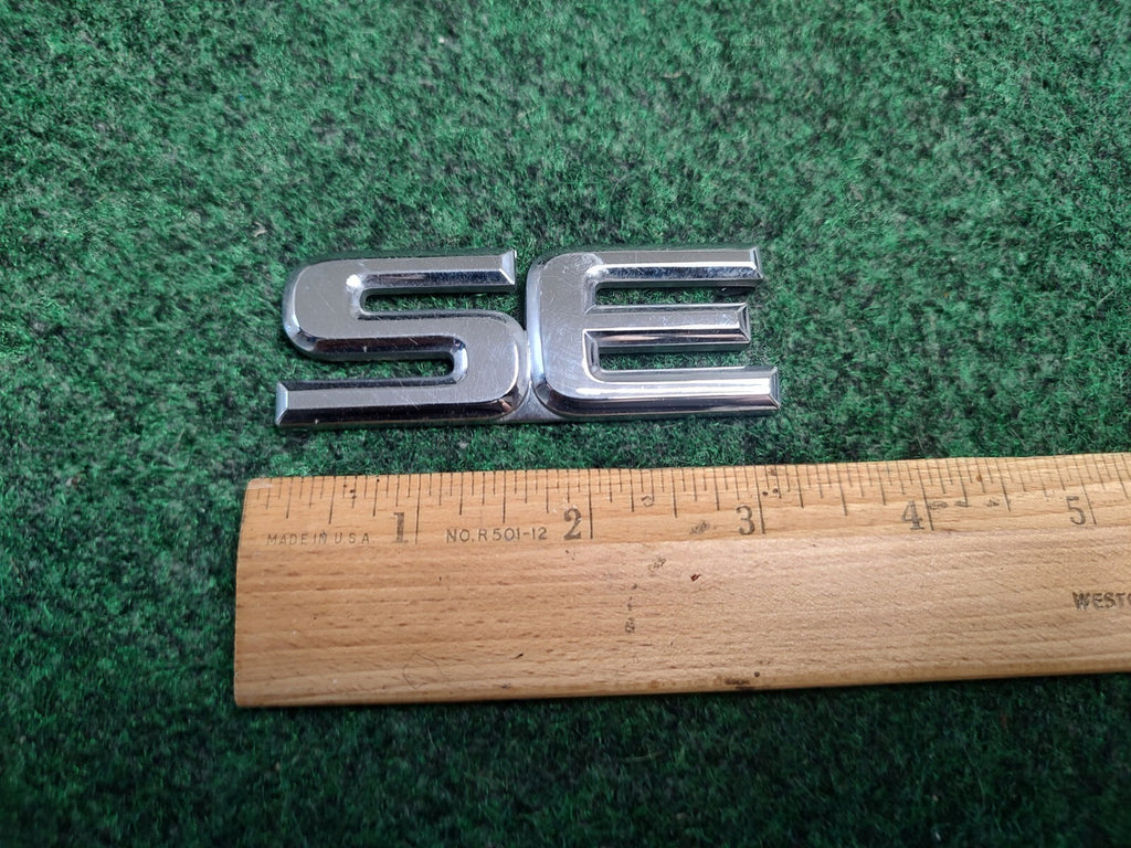 1999-2004 Nissan Pathfinder SE Rear Hatch Liftgate Emblem Badge 908962W600 2S9