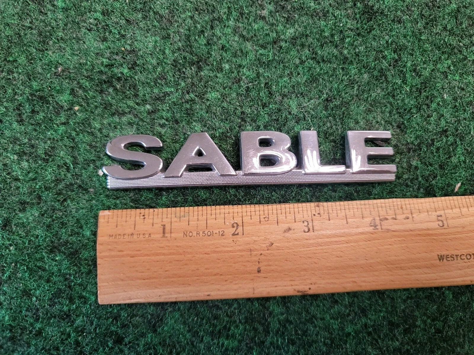00 01 02 03 MERCURY SABLE REAR GATE LID EMBLEM BADGE SYMBOL LOGO OEM 2M4