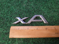 2004-2006 Scion xA Emblem Logo Badge Symbol Rear Tailgate Trunk Silver Gray 2S9