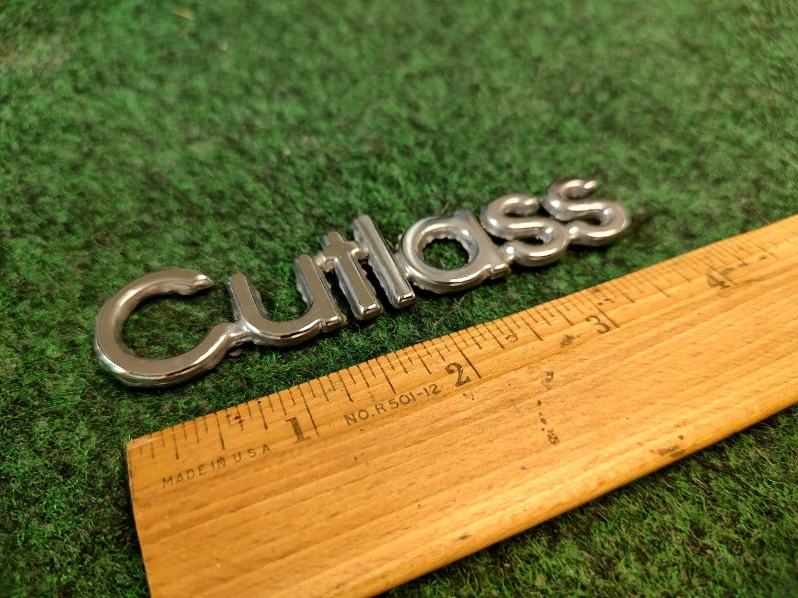 Oldsmobile Cutlass Emblem Nameplate Chrome Metal OEM 1S1