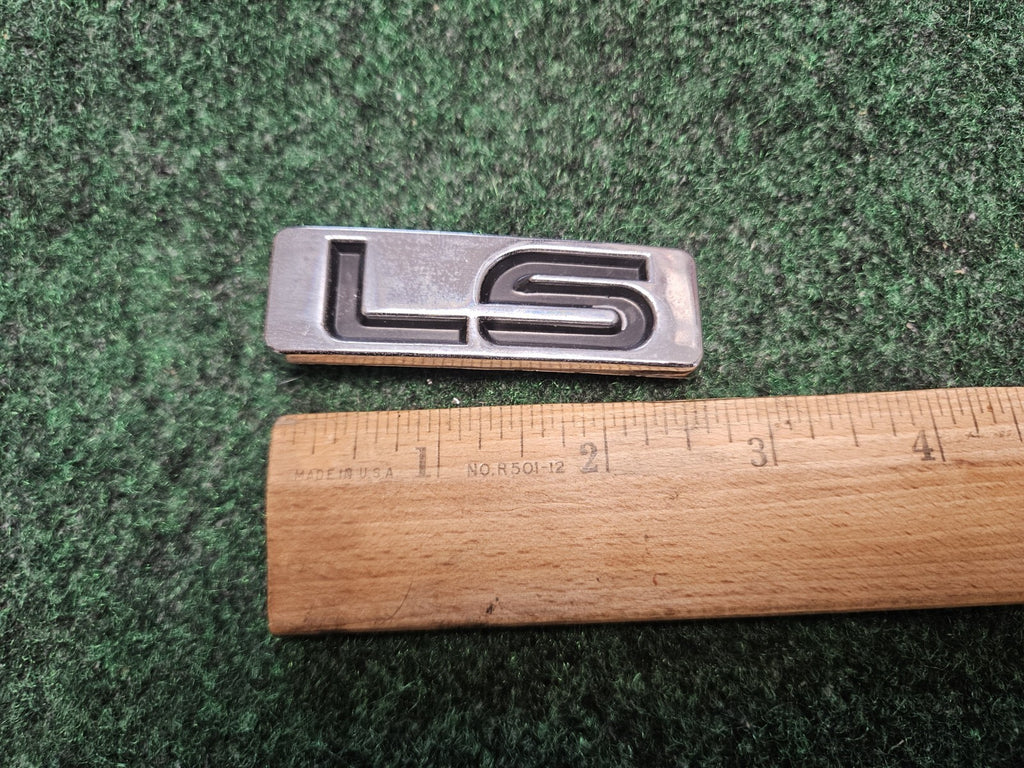 Vintage Ford "LS" Chrome Black Emblem OEM f8db16702 Db Unknown Make Model 5M7