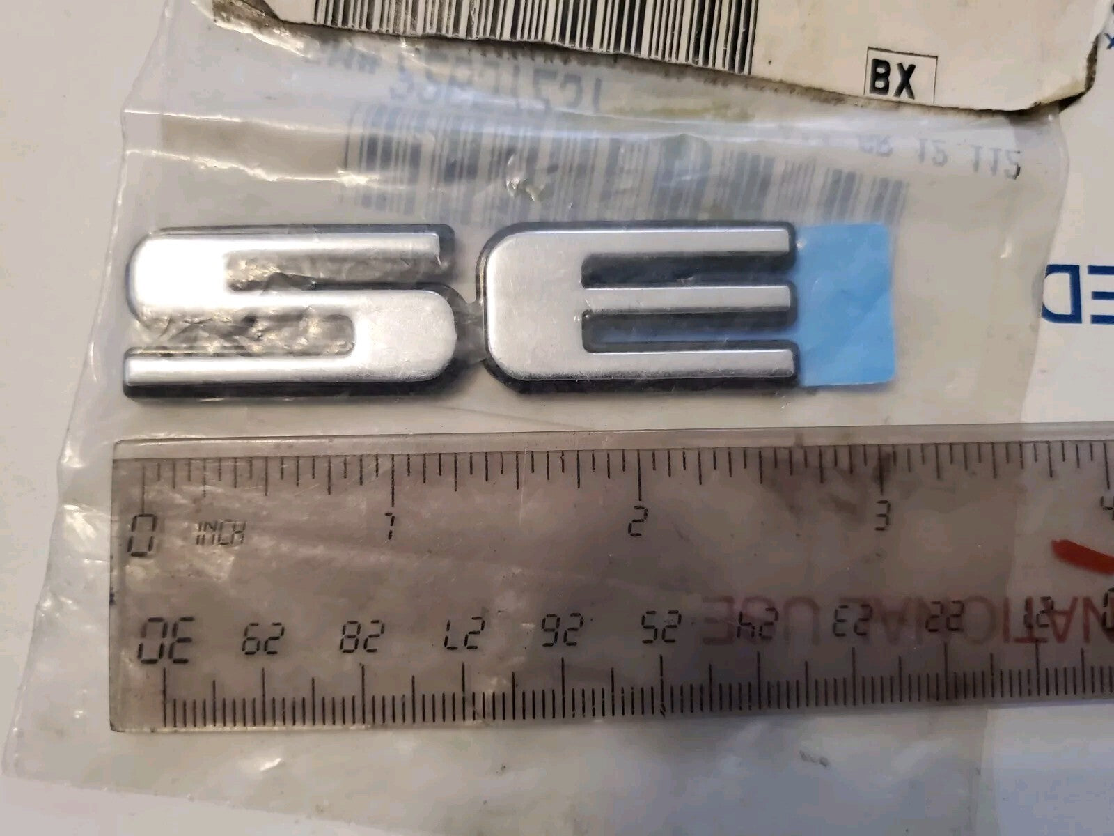 22657237 OEM GM EMBLEM PLATE BADGE SE FRONT DOOR 1999-2002 Pontiac GRAND AM 3L7