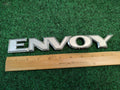 02 03 04 GMC ENVOY REAR LID TAIL GATE SIDE DOOR EMBLEM LOGO BADGE USED OEM 3M1