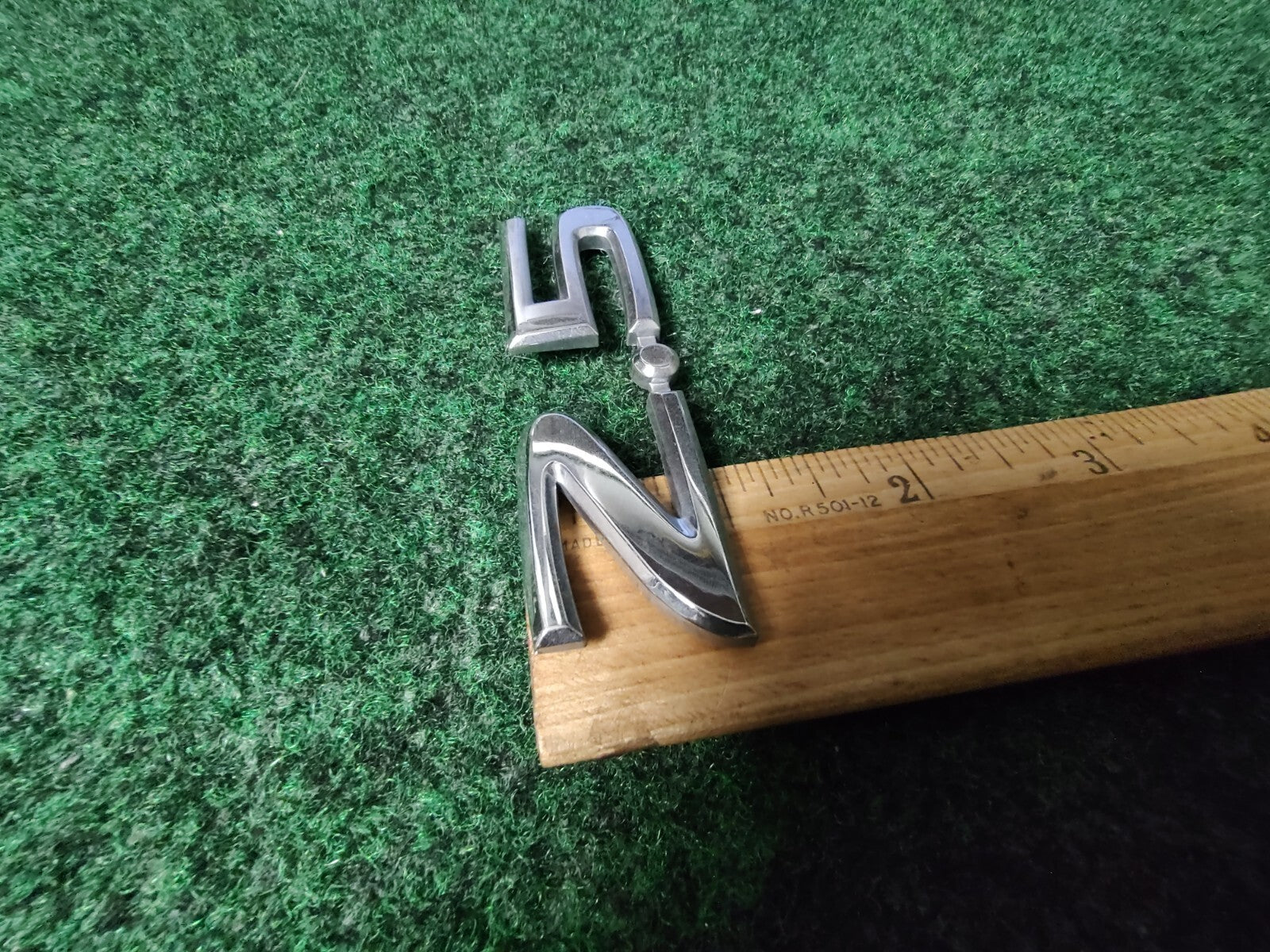 NISSAN 2.5 REAR CHROME EMBLEM LOGO SYMBOL BADGE OEM 7S1