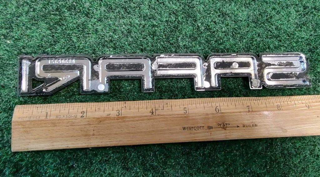 1995-2005 GMC Safari Front Door Nameplate Badge Emblem 15690680 OEM 8L4