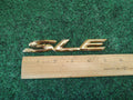 TOYOTA SOLARA SLE REAR LID Gold EMBLEM LOGO BADGE SIGN  SYMBOL 3S9