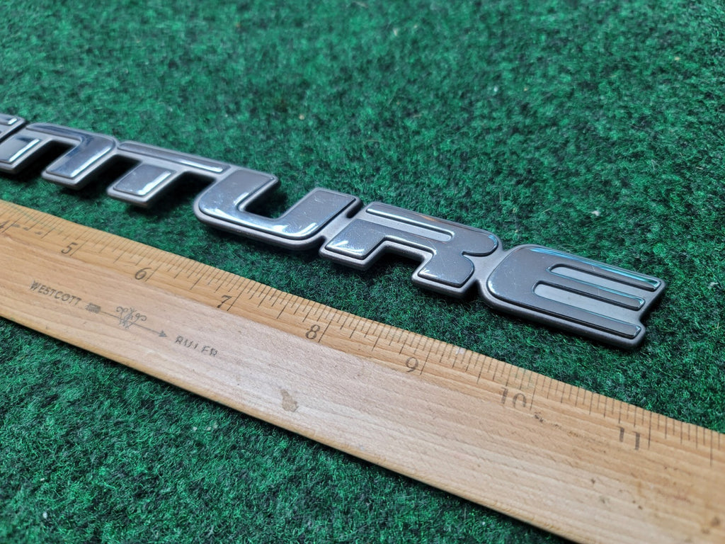 1997-2005 CHEVROLET VENTURE REAR EMBLEM BADGE LOGO CHROME OEM 1M1