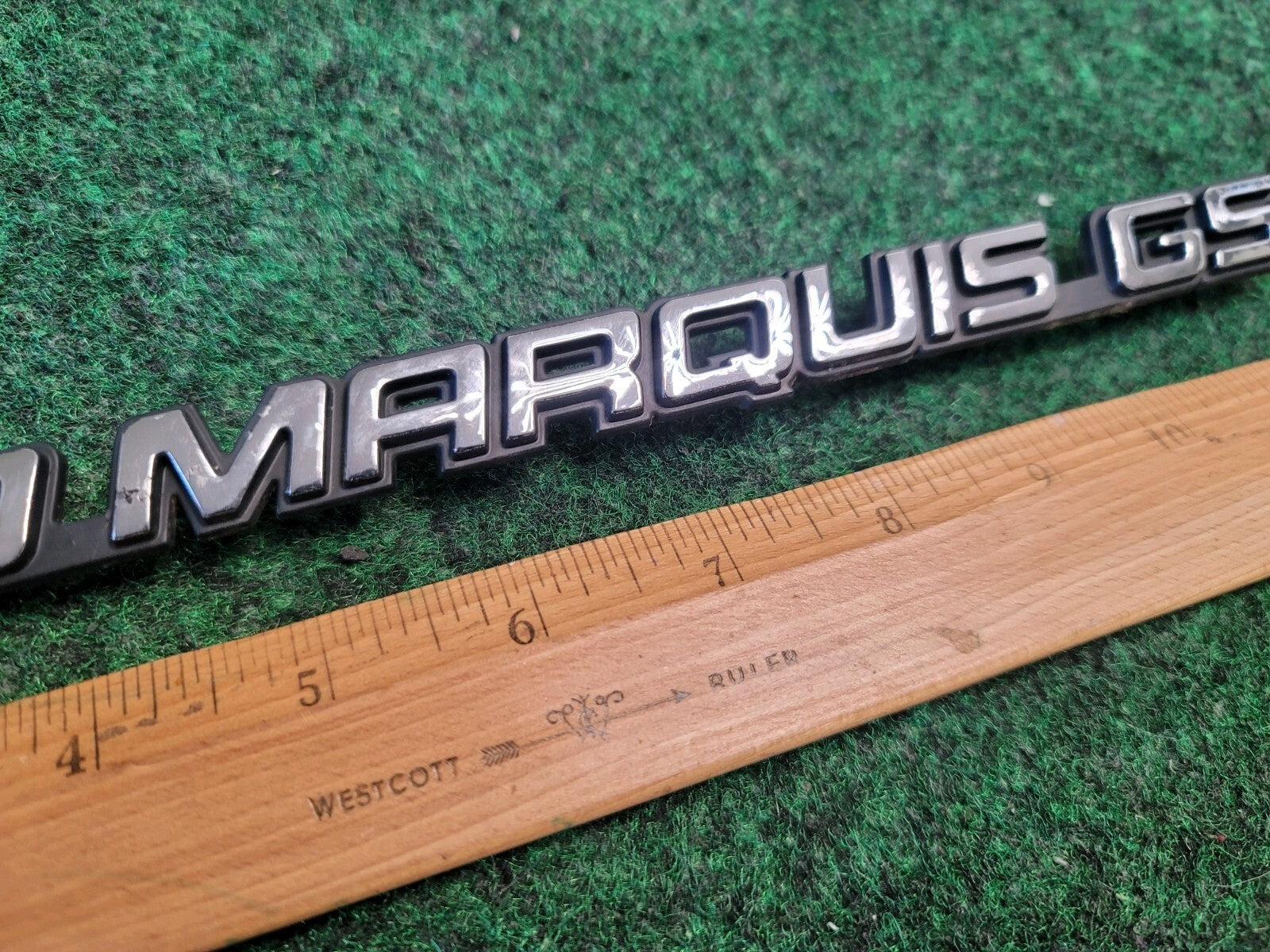 98 99 00 01 02 MERCURY GRAND MARQUIS GS REAR EMBLEM BADGE SYMBOL OEM 1M6