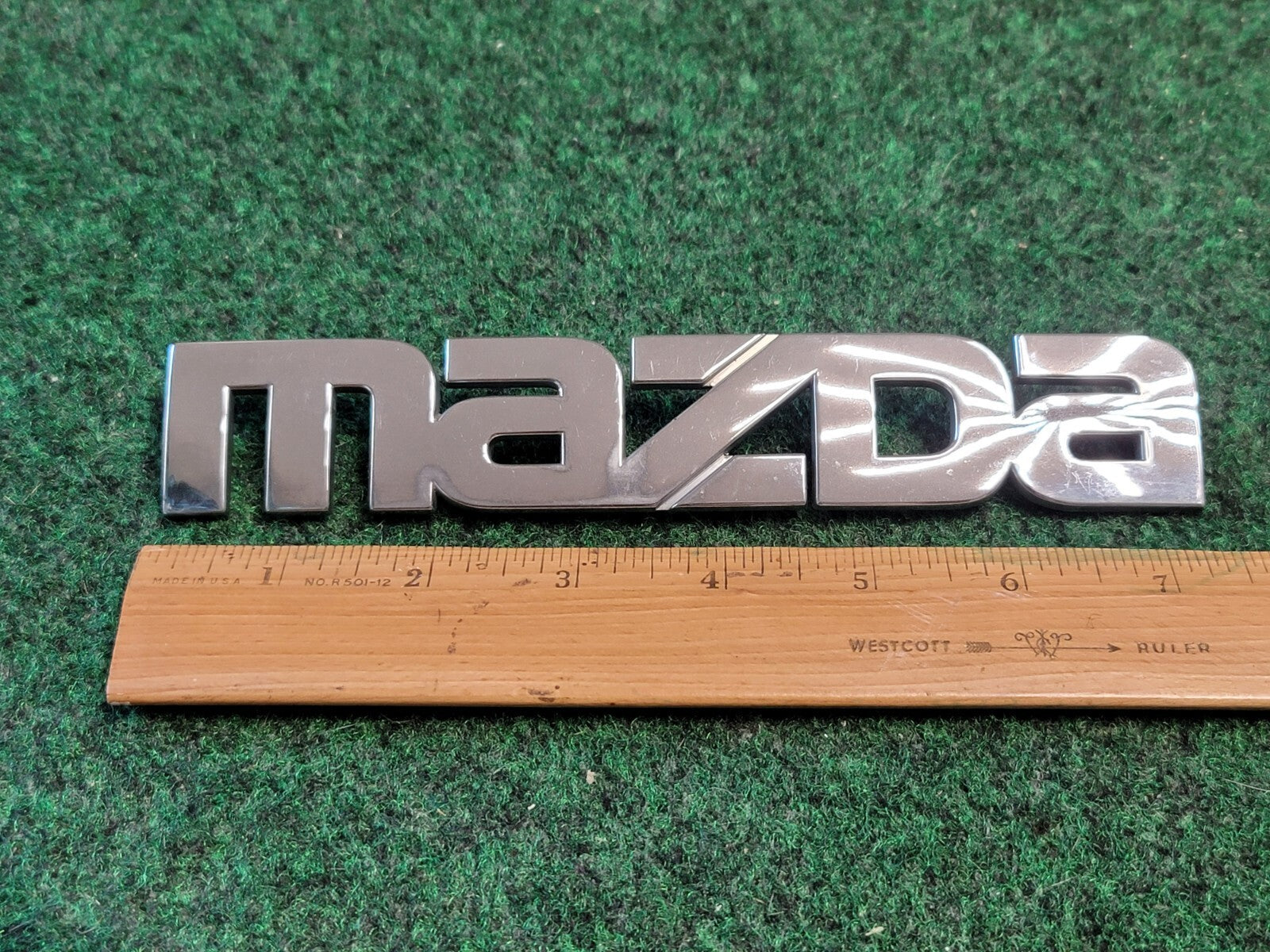 2000-2006 Mazda MPV Rear Emblem Name Plate LC62-51710 7L1