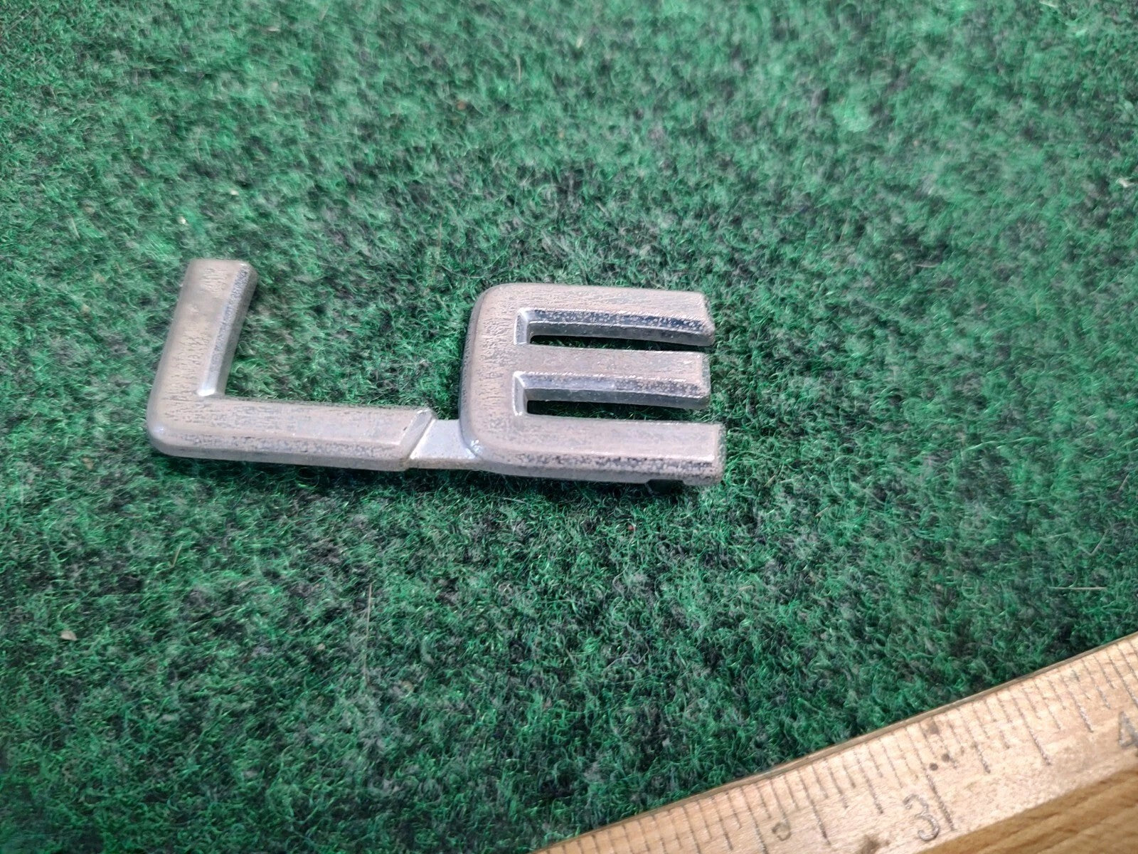 Toyota OEM LE Chrome Emblem Badge Logo Nameplate Name Plate 2S2