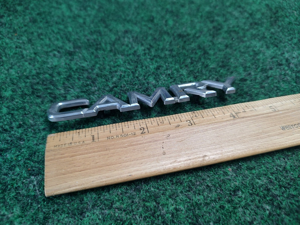Toyota Camry Emblem Badge Name Plate Logo Chrome OEM Genuine 8L2