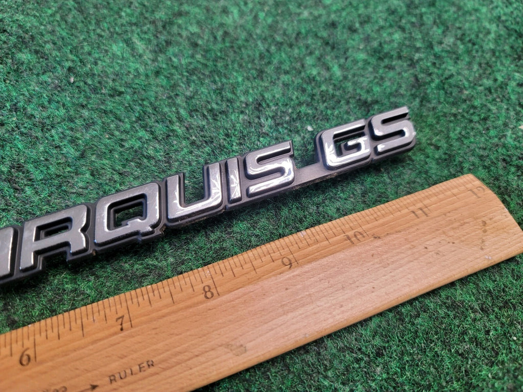 98 99 00 01 02 MERCURY GRAND MARQUIS GS REAR EMBLEM BADGE SYMBOL OEM 1M6