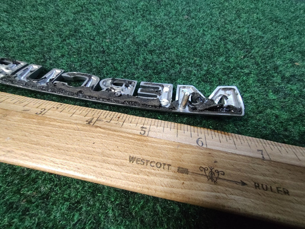 MERCURY REAR GATE LID EMBLEM BADGE SYMBOL LOGO OEM 6S1