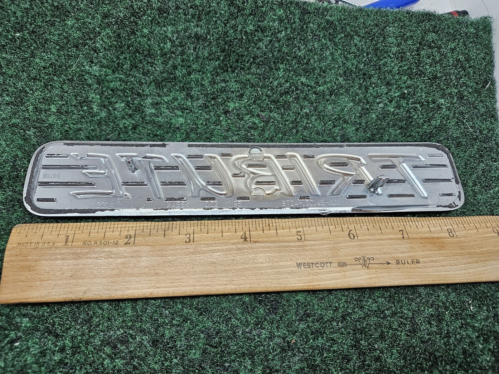 2008 Mazda Tribute Front Side Fender Door Emblem Nameplate ZZC052771 OEM GL1