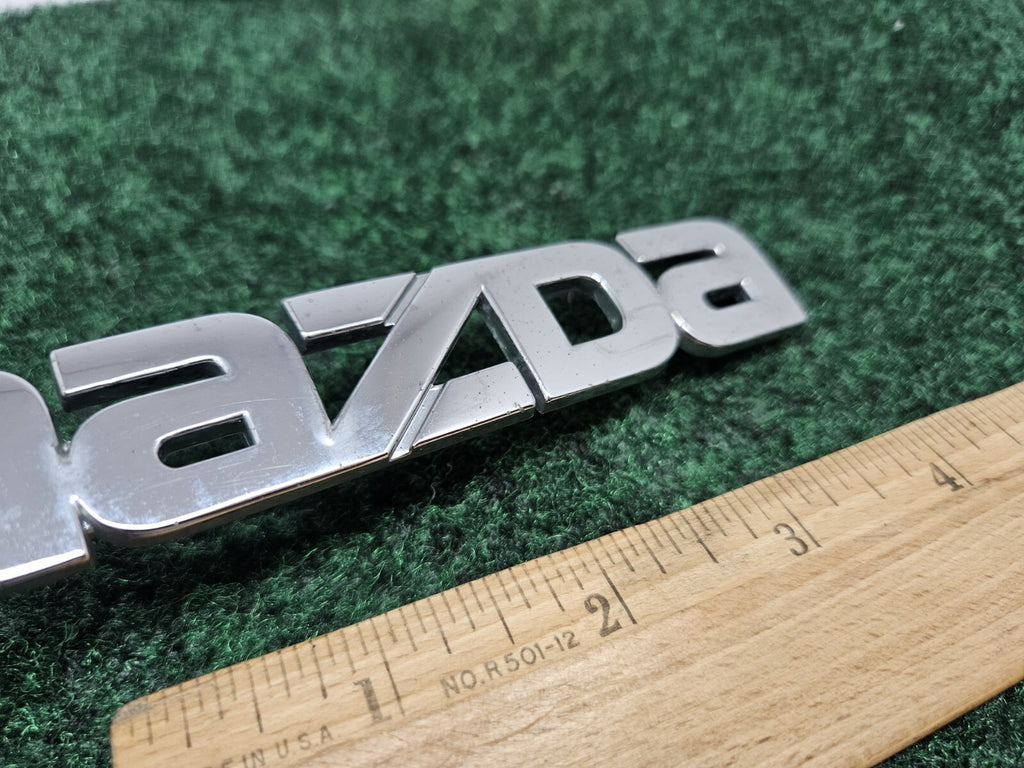 1999 00 2001 2002 2003 Mazda Protege Rear Trunk Nameplate Emblem B25D-51-710 GL1