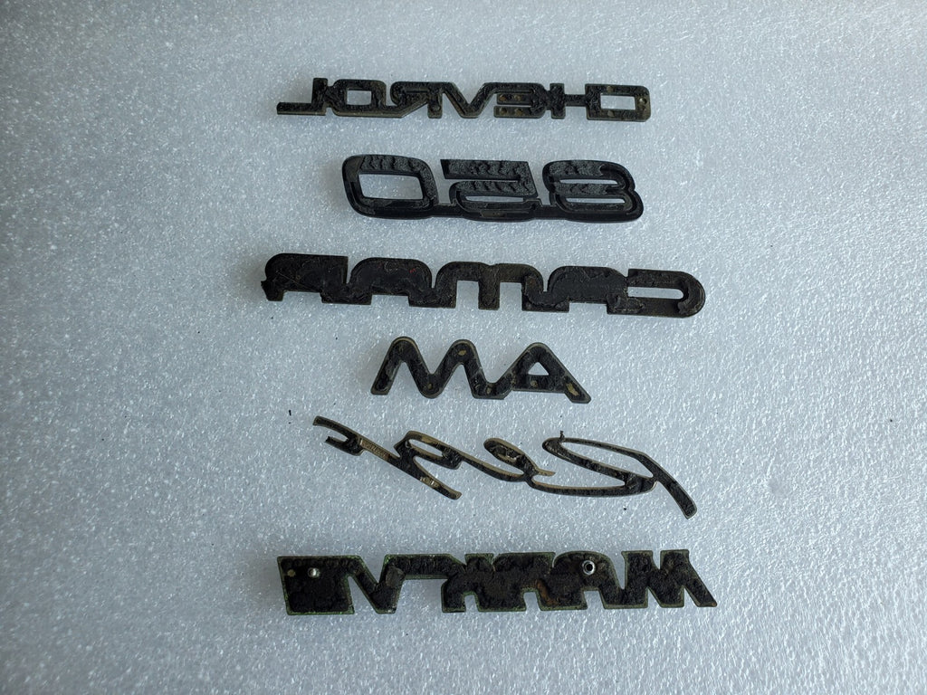 Misc Lot Of Emblwms Vintage Letters Logo OEM Mark VIII VOLVO Regal Camaro VNTG