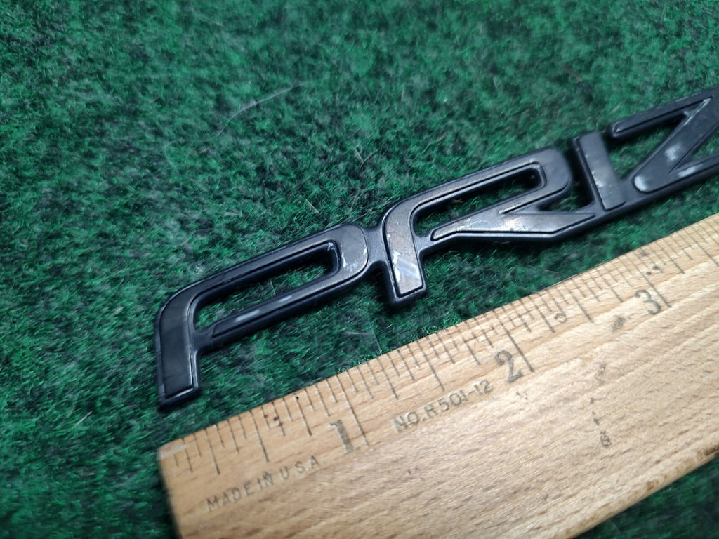 Chevy PRIZM Emblem Badge Nameplate Plastic Chrome Script 75443-1A680 3S3