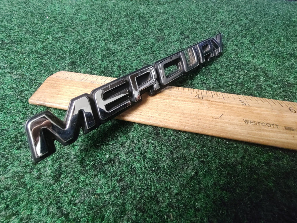 MERCURY REAR GATE LID EMBLEM BADGE SYMBOL LOGO OEM 8L3