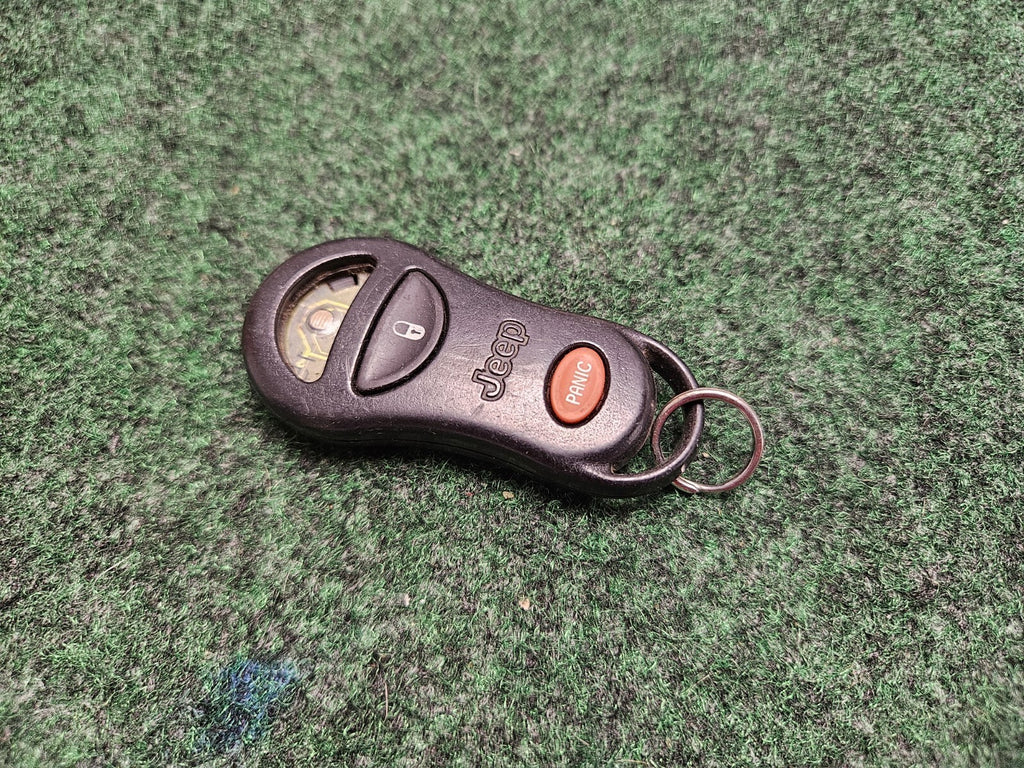 Jeep Grand Cherokee Remote 56036859 1999-2004 Key KeyFob Transmitter Genuine 7S6