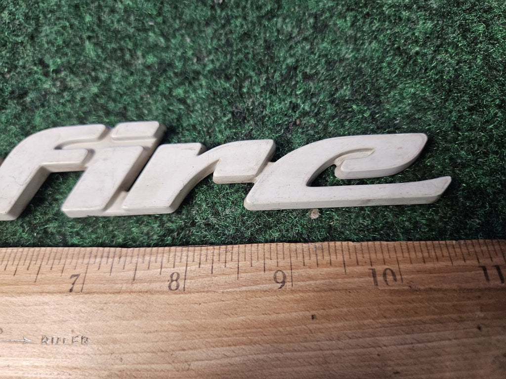1998-2004 Pontiac Sunfire Emblem Badge Logo Nameplate Name Plate White 4M9