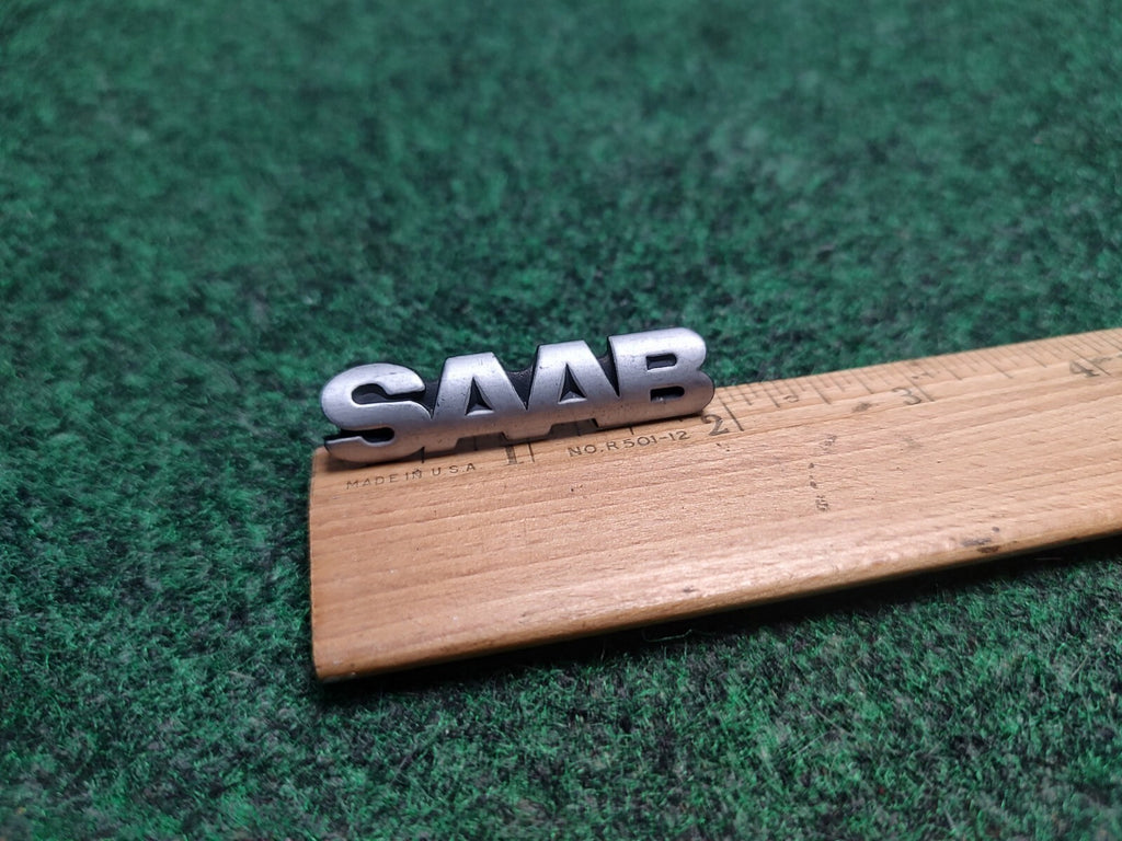Genuine Saab Front Grille Emblem Name Plate OEM 900 NG Logo Badge 448127 1S1