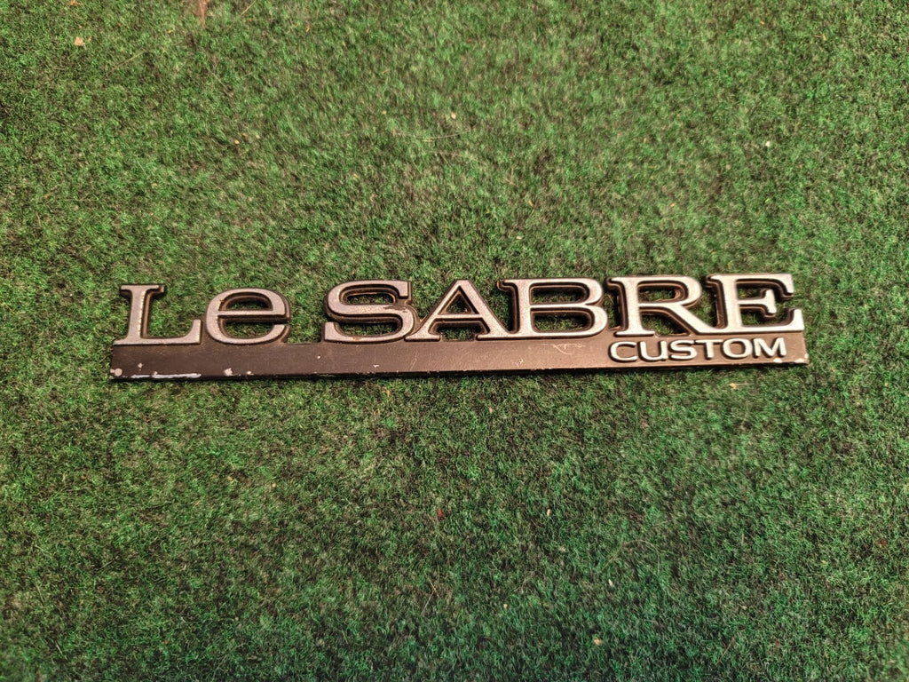 BUICK LESABRE CUSTOM - OEM EMBLEM BADGE SYMBOL LOGO NAME PLATE 9L6