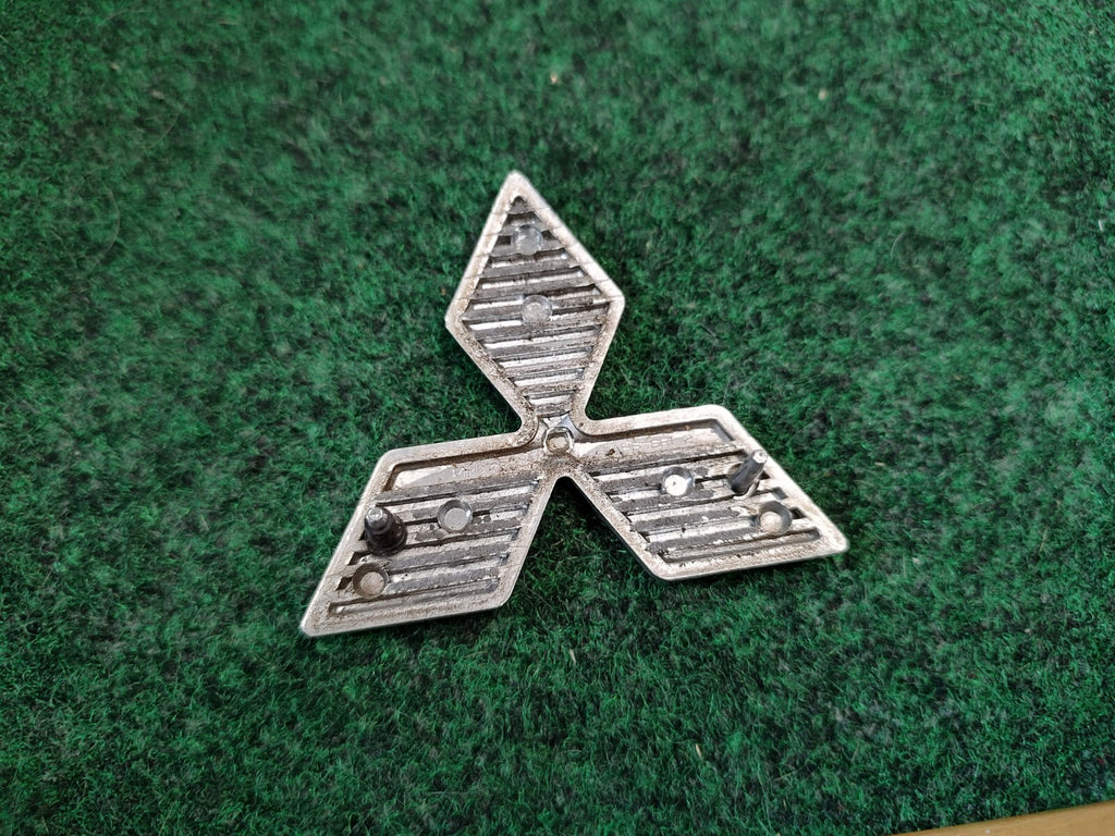 2002-2005 Mitsubishi Eclipse Rear Trunk Emblem Logo Nameplate MR971390 OEM 1S5
