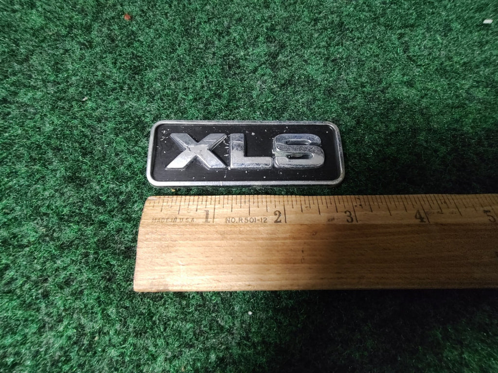 Ford OEM XLS Black & Chrome Plastic Emblem Badge Logo Nameplate Name Plate 6L5