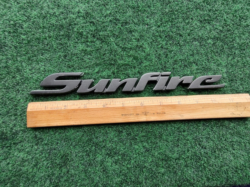 1998-2004 Pontiac Sunfire Gray Emblem Badge Logo Nameplate Name Plate 5S2