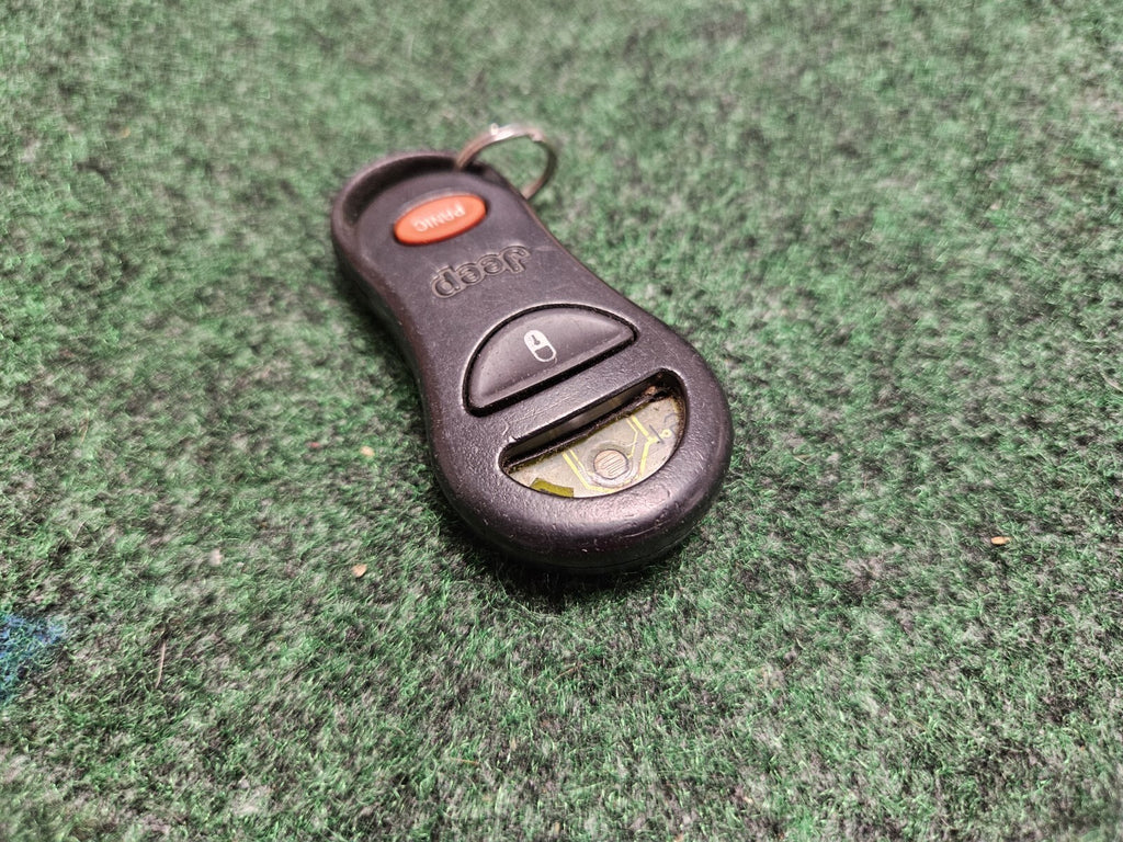 Jeep Grand Cherokee Remote 56036859 1999-2004 Key KeyFob Transmitter Genuine 7S6